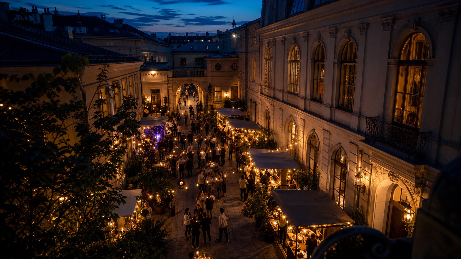 Busy night market in a Viennese courtyard